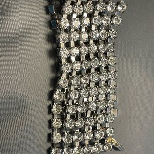 Rhinestone tennis bracelet. 1 in wide